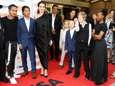 FILE PHOTO: Director Angelina Jolie arrives on the red carpet with her six children (L-R) Maddox Jolie-Pitt, Pax Jolie-Pitt, Vivienne Jolie-Pitt, Knox Leon Jolie-Pitt, Shiloh Jolie-Pitt, and Zahara Jolie-Pitt for the film "First They Killed My Father" at the Toronto International Film Festival (TIFF), in Toronto, Ontario, Canada, September 11, 2017.  REUTERS/Mark Blinch/File Photo