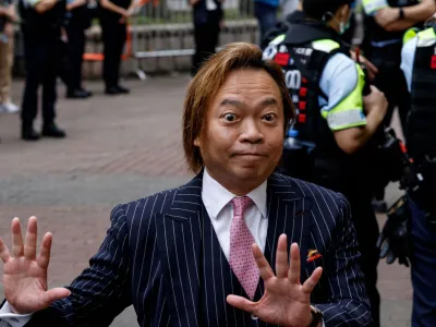 Lawrence Lau Wai-chung arrives at the West Kowloon Magistrates' Courts building, before the verdict of the&nbsp;47&nbsp;pro-democracy&nbsp;activists&nbsp;charged under the national security law, in Hong Kong, China, May 30, 2024. REUTERS/Tyrone Siu   TPX IMAGES OF THE DAY