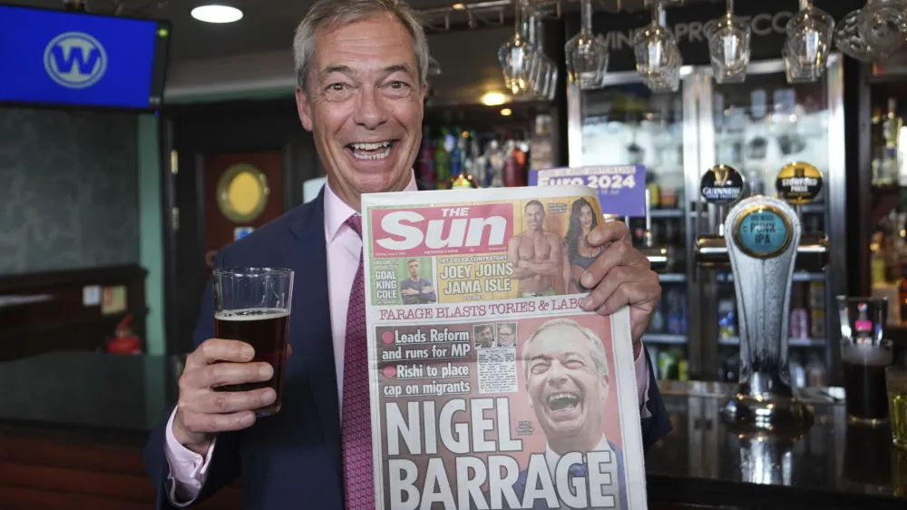 Leader of Reform UK Nigel Farage speaks to the media following the launch of his General Election campaign in Clacton-on-Sea, Essex, England, Tuesday June 4, 2024. Mr Farage announced on Monday that he will stand for parliament in Clacton and lead Reform UK for the next five years. (James Manning/PA via AP)