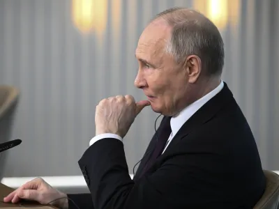 Russian President Vladimir Putin listens to a journalist's question as he meets with senior news leaders of international news agencies on the sidelines of the St. Petersburg International Economic Forum at the Lakhta Center skyscraper, the headquarters of Russian gas monopoly Gazprom in St. Petersburg, Russia, on Wednesday, June 5, 2024. (Vladimir Astapkovich, Sputnik, Kremlin Pool Photo via AP)