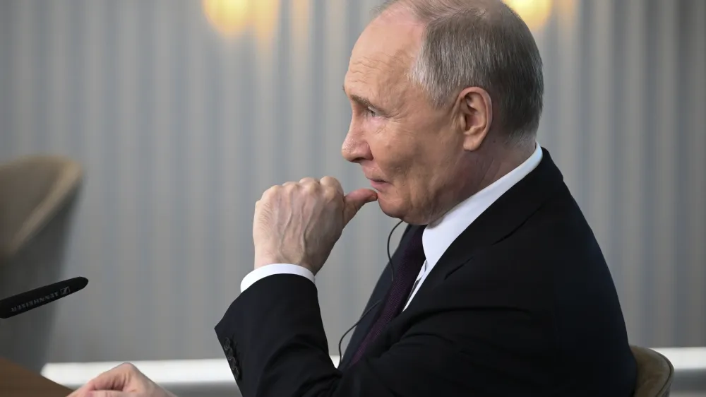 Russian President Vladimir Putin listens to a journalist's question as he meets with senior news leaders of international news agencies on the sidelines of the St. Petersburg International Economic Forum at the Lakhta Center skyscraper, the headquarters of Russian gas monopoly Gazprom in St. Petersburg, Russia, on Wednesday, June 5, 2024. (Vladimir Astapkovich, Sputnik, Kremlin Pool Photo via AP)