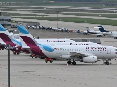 FILED - 06 October 2022, Stuttgart: Aircraft's of Eurowings airline are seen parked on the apron of the airport in Stuttgart. Photo: Bernd Wei&szlig;brod/dpa