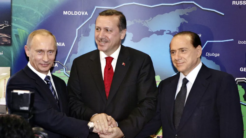 From left, Russian President Vladimir Putin, Turkish Prime Minister Recep Tayyip Erdogan and Italian Prime Minister Silvio Berlusconi pose for photographers at the pumping station in the village of Durusu, near the northern Turkish city of Samsun, Thursday, Nov. 17, 2005, during the inauguration ceremony of the Blue Stream pipeline, the world's deepest undersea pipeline. Russian President Vladimir Putin and Turkey's prime minister officially opened a US$3.2 billion (2.6 billion) pipeline connecting Turkey to Russian gas fields and spoke of Turkey's potential to become an energy hub for Europe and Israel.(AP Photo/ITAR-TASS/Presidential Press Service, Sergey Zhukov)