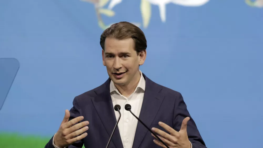 FILE - In this Thursday, July 1, 2021 file photo, Austrian Chancellor Sebastian Kurz talks at the "Austrian World Summit" about the visions and actions to fight the climate crisis in Vienna, Austria. Austria&acirc;&euro;&trade;s conservative People&acirc;&euro;&trade;s Party has voted overwhelmingly to reelect Chancellor Sebastian Kurz as its leader at a party gathering, it was announced Saturday, Aug. 28. Kurz, 35, received the backing of 533 of 536 delegates, or 99.4%. (AP Photo/Lisa Leutner, file)