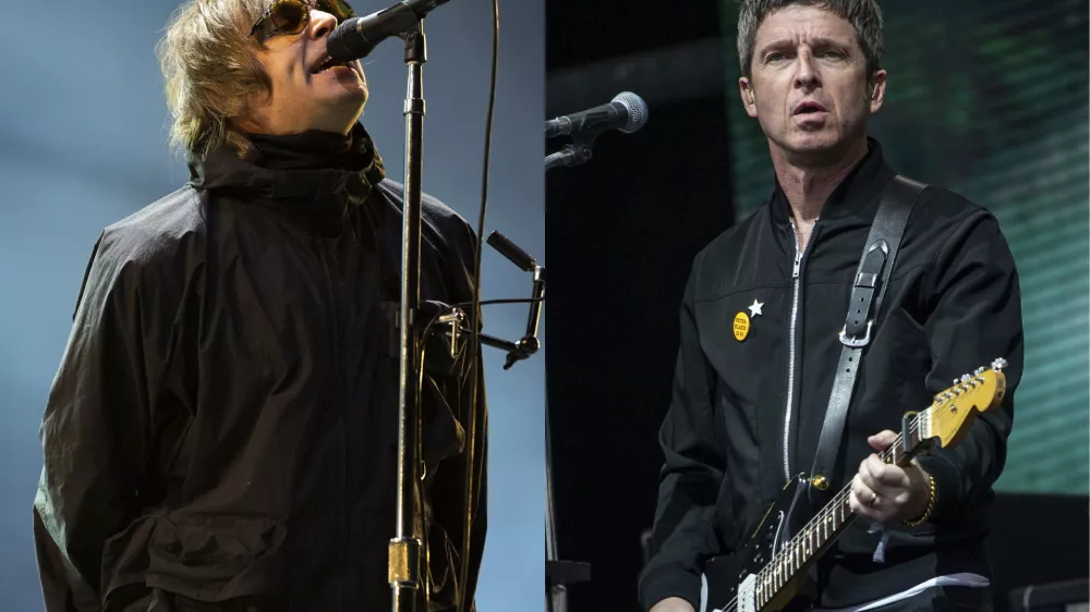 Liam Gallagher performs at the Reading Music Festival, England on Aug. 29, 2021, left, and Noel Gallagher performs at the Glastonbury Festival in Worthy Farm, Somerset, England, on June 25, 2022. (AP Photo)