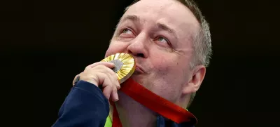 Paris 2024 Paralympics - Shooting - R4 - Mixed 10m Air Rifle Standing SH2 Final - Chateauroux Shooting Centre, Deols, France - August 30, 2024 Gold medallist Francek Gorazd Tirsek of Slovenia celebrates after the final REUTERS/Eng Chin An