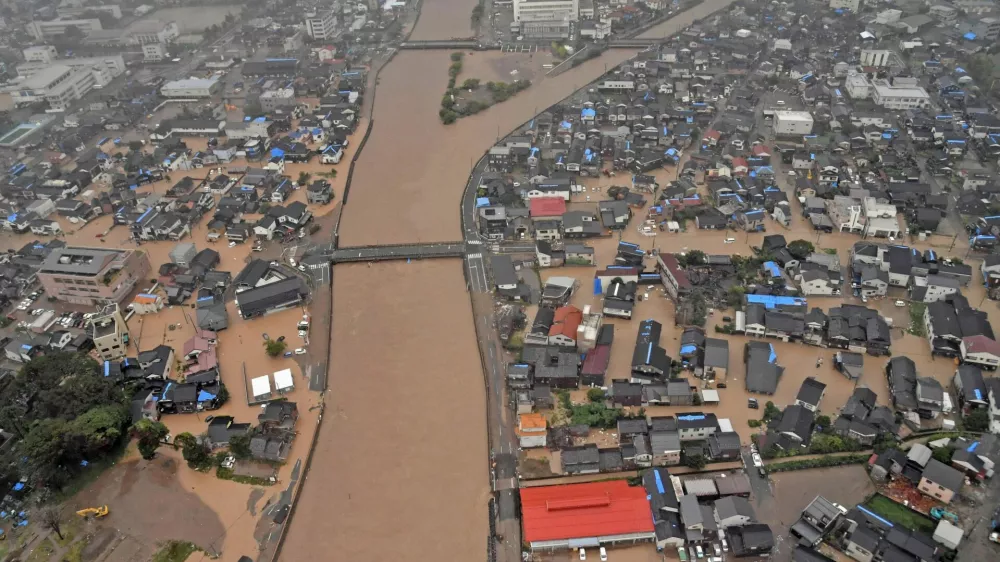 An aerial view taken by a helicopter shows a flooded residential area caused by torrential rain in Wajima, Ishikawa Prefecture, Japan September 21, 2024, in this photo taken by Kyodo. Mandatory credit Kyodo/via REUTERS  ATTENTION EDITORS - THIS IMAGE HAS BEEN SUPPLIED BY A THIRD PARTY. MANDATORY CREDIT. JAPAN OUT. NO COMMERCIAL OR EDITORIAL SALES IN JAPAN.   TPX IMAGES OF THE DAY