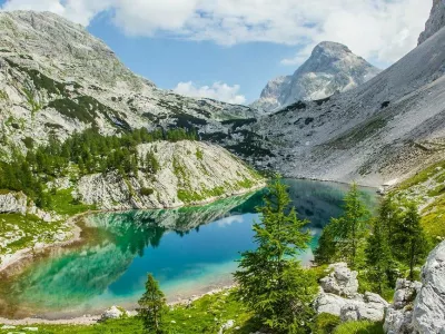 &Scaron;tevilna praznovanja ob 100-letnici zavarovanja Doline Triglavskih jezer.  F TNP