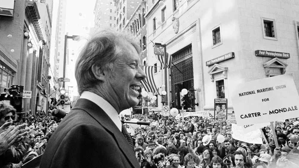 FILE - An estimated crowd of 35,000 people gather for a noontime speech by Presidential candidate Jimmy Carter in downtown Philadelphia, Oct. 29, 1976. (AP Photo, File)
