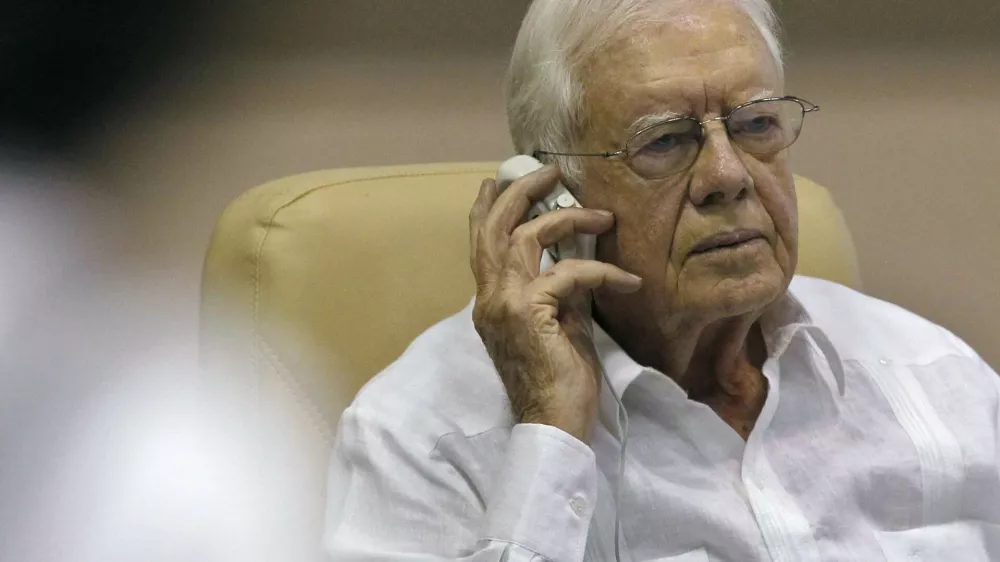 Former U.S. President Jimmy Carter attends a news conference in Havana March 30, 2011.Carter met with leading Cuban dissidents on Wednesday and told them he expected to visit imprisoned U.S. aid contractor Alan Gross before leaving the communist-ruled island. REUTERS/Enrique De La Osa (CUBA - Tags: POLITICS)
