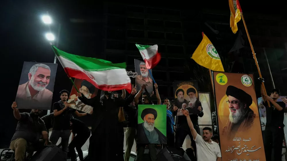 Iraqi people celebrate on a street, after the IRGC attack on Israel, in Basra, Iraq, October 1, 2024. REUTERS/Essam Al-sudani