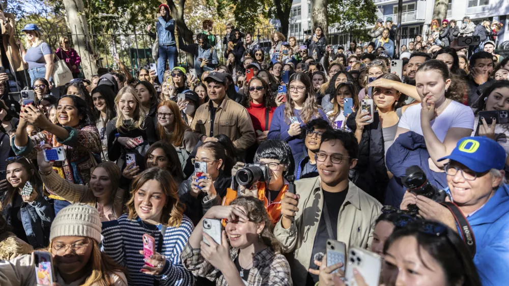 Crowds look on at the Timothee Chalamet lookalike contest near Washington Square Park, Sunday, Oct. 27, 2024, in New York. (AP Photo/Stefan Jeremiah)
