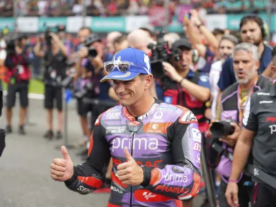 Spanish rider Jorge Martin of&nbsp;Prima Pramac Racing reacts after winning the sprint race at Sepang International Circuit ahead of MotoGP race in Sepang, outskirts of Kuala Lumpur, Saturday, Nov. 2, 2024. (AP Photo/Vincent Thian)
