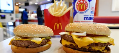 FILE- In this March 6, 2018, file photo, a McDonald's Quarter Pounder, left, and Double Quarter Pound burger is shown in Atlanta. (AP Photo/Mike Stewart, File)