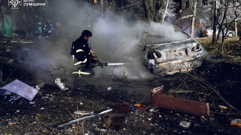 A firefighter works at the site of a residential area hit by a Russian missile strike, amid Russia's attack on Ukraine, in Sumy, Ukraine November 17, 2024. Press service of the State Emergency Service of Ukraine in Sumy region/Handout via REUTERS ATTENTION EDITORS - THIS IMAGE HAS BEEN SUPPLIED BY A THIRD PARTY. DO NOT OBSCURE LOGO.