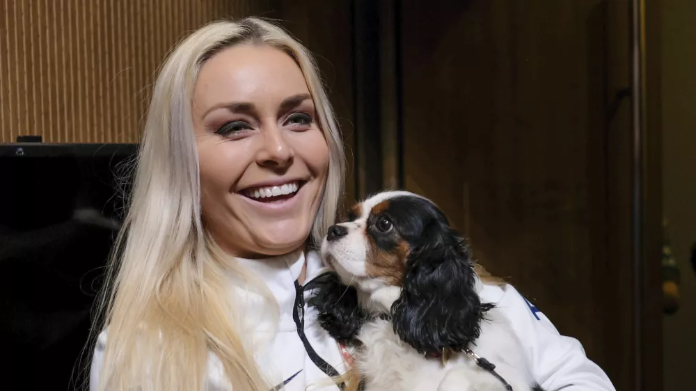 Znana je tudi kot ljubiteljica živali: na fotografiji s svojo psičko Lucy. / Foto: AP