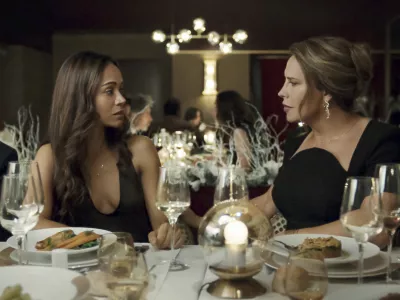 This image released by Netflix shows Karla Sof&iacute;a Gasc&oacute;n, right, and Zoe Salda&ntilde;a in a scene from "Emilia P&eacute;rez." (Shanna Besson/Netflix via AP)