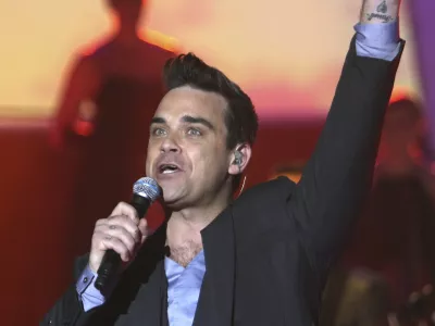 Robbie Williams bo zvezda julijskega koncerta v Trstu. /&nbsp;Foto: AP