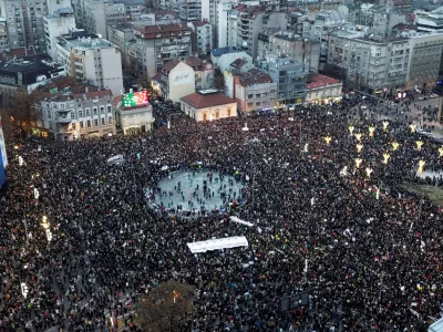 A drone view shows people gathering during a protest against government policies, corruption and the negligence which they blame for the deaths of the victims in the Novi Sad railway station disaster in November, in Belgrade, Serbia, December 22, 2024. REUTERS/Djordje Kojadinovic