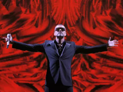 FILE - In this Sept. 9, 2012 file photo, British singer George Michael performs at a concert to raise money for the AIDS charity Sidaction, during the Symphonica tour at Palais Garnier Opera house in Paris, France. Michael, who rocketed to stardom with WHAM! and went on to enjoy a long and celebrated solo career lined with controversies, has died, his publicist said Sunday, Dec. 25, 2016. He was 53. (AP Photo/Francois Mori, File)