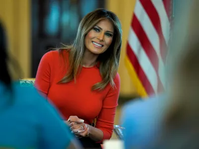 FILE PHOTO: U.S. first lady Melania Trump sits during a listening session with students at the White House in Washington, U.S., April 9, 2018. REUTERS/Joshua Roberts/File Photo