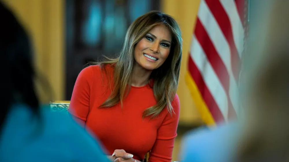 FILE PHOTO: U.S. first lady Melania Trump sits during a listening session with students at the White House in Washington, U.S., April 9, 2018. REUTERS/Joshua Roberts/File Photo