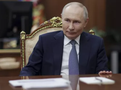 Russian President Vladimir Putin listens to President of the National Medical Research Centre for Endocrinology Ivan Dedov during their meeting at the Kremlin, in Moscow, Russia, on Saturday, Jan. 18, 2025. (Gavriil Grigorov, Sputnik, Kremlin Pool Photo via AP)