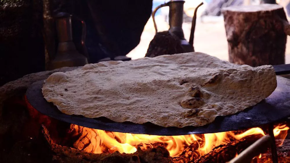 Priprava plo&scaron;čatega kruha / Foto: Unesco