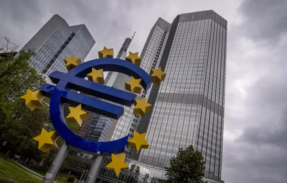 FILE - The Euro sculpture stands in front of the former headquarters of the European Central Bank (ECB) in Frankfurt, Germany, Tuesday, May 23, 2023. (AP Photo/Michael Probst, File)