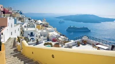 Fira panorama with caldera view and Nea Kameni, Santorini, Greece