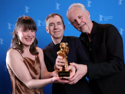 Norwegian director and screenwriter Dag Johan Haugerud poses with producers Yngve Saether and Hege Hauff Hvattum and the Golden Bear for Best Film award during the winner's photocall of the 75th Berlinale International Film Festival in Berlin, Germany, February 22, 2025.   Ronny Hartmann/Pool via REUTERS CORRECTING SURNAME FROM "HVATTUMON" TO "HVATTUM".