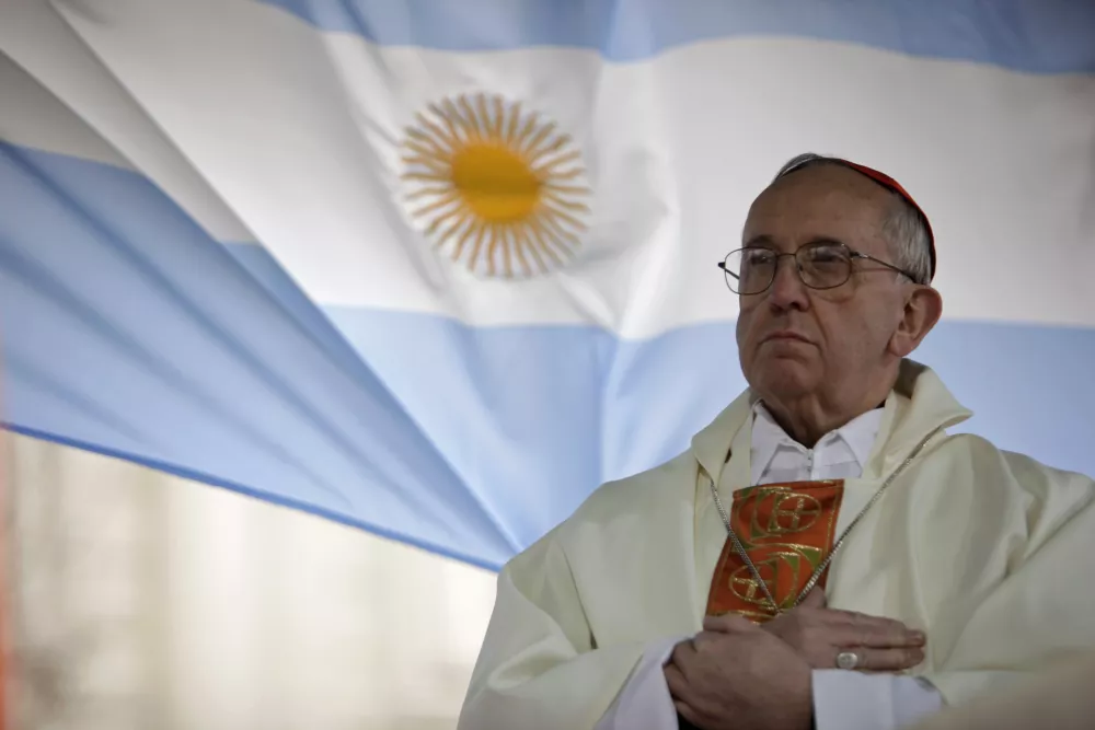 FILE - This Aug. 7, 2009 file photo shows Argentina's Cardinal Jorge Bergoglio giving a mass outside the San Cayetano church in Buenos Aires. Bergoglio, who took the name of Pope Francis, was elected on Wednesday, March 13, 2013 the 266th pontiff of the Roman Catholic Church. (AP Photo/Natacha Pisarenko, files)