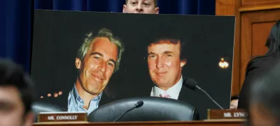 Rep. Jared Moskowitz (D-FL) holds up a photo of former U.S. President Donald Trump with late sex offender Jeffrey Epstein during a meeting of the the House Oversight and Accountability Committee to markup a resolution and report to hold Hunter Biden, President Joe Biden's son, in contempt of Congress, after he refused to appear for a closed-door deposition, at the Capitol in Washington, U.S., January 10, 2024. REUTERS/Kevin Lamarque