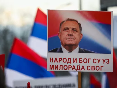 A sign is displayed as Bosnian Serbs rally in front of the regional parliament in support of President of Republika Srpska (Serb Republic) Milorad Dodik, a day ahead of his court verdict on charges that he defied rulings by an international peace envoy, in Banja Luka, Bosnia and Herzegovina, February 25, 2025. REUTERS/Amel Emric
