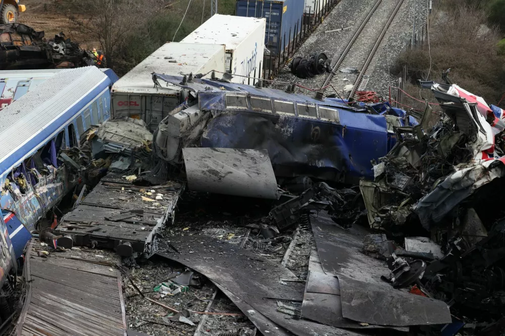 Destroyed train carriages are seen at the site of a crash, where two trains collided, near the city of Larissa, Greece, March 1, 2023. REUTERS/Alexandros Avramidis