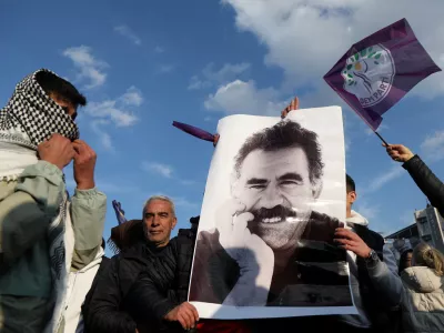 FILE PHOTO: A demonstrator holds a picture of jailed Kurdish militant leader Abdullah Ocalan during a rally in Diyarbakir, Turkey, February 27, 2025. REUTERS/Sertac Kayar/File Photo