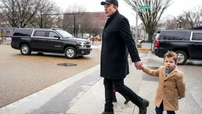 FILE PHOTO: Elon Musk walks with his son X &AElig; A-12, on the day he met with Indian Prime Minister Narendra Modi at Blair House, in Washington, D.C., U.S., February 13, 2025. REUTERS/Nathan Howard/File Photo