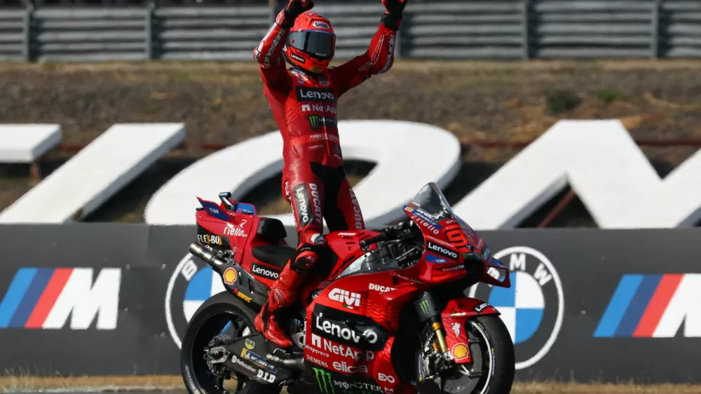 MotoGP - Thailand Grand Prix - Chang International Circuit, Buriram, Thailand - March 2, 2025 Ducati Lenovo Team's Marc Marquez celebrates after winning the MotoGP race REUTERS/Athit Perawongmetha