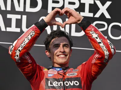 MotoGP winner Spain's rider Marc Marquez celebrates after winning the MotoGP race at the Chang International Circuit in Buriram, Thailand, Sunday, March 2, 2025. (AP Photo/Kittinun Rodsupan)