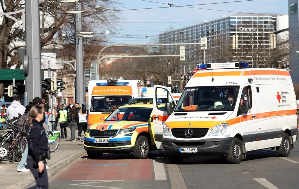 Ambulance vehicles are parked near the scene after a car drove into a crowd, in Mannheim, Germany, March 3, 2025. REUTERS/Alfio Marino