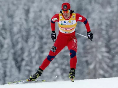 Marit Bjoergen from Norway competes during the women's 1,4 km cross country free sprint qualification of the FIS World Cup in Davos, Switzerland, Sunday, Dec. 12, 2010. (AP Photo/Keystone, Arno Balzarini)