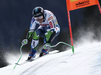 Slovenia's Ilka Stuhec speeds down the course during a women's Super-G, at the Alpine Ski World Championships, in Saalbach-Hinterglemm, Austria, Thursday, Feb. 6, 2025. (AP Photo/Gabriele Facciotti)