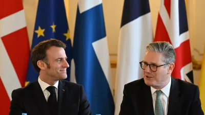 France's President Emmanuel Macron and Britain's Prime Minister Keir Starmer chat ahead of a plenary meeting at a summit held at Lancaster House in central London on March 2, 2025. JUSTIN TALLIS/Pool via REUTERS