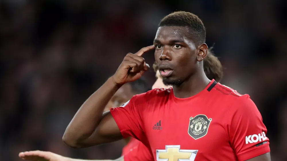 Soccer Football - Premier League - Wolverhampton Wanderers v Manchester United - Molineux Stadium, Wolverhampton, Britain - August 19, 2019  Manchester United's Paul Pogba reacts after Wolverhampton Wanderers' first goal  Action Images via Reuters/Carl Recine  EDITORIAL USE ONLY. No use with unauthorized audio, video, data, fixture lists, club/league logos or "live" services. Online in-match use limited to 75 images, no video emulation. No use in betting, games or single club/league/player publications. Please contact your account representative for further details.