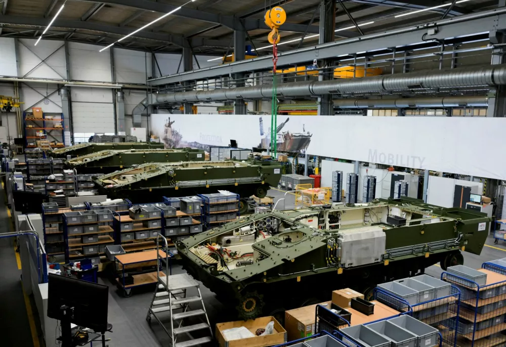 FILE PHOTO: Lynx fighting vehicles are pictured at a production line at the plant of German company Rheinmetall, which produces weapons and ammunition for tanks and artillery, during a media tour in Unterluess, Germany, June 6, 2023. REUTERS/Fabian Bimmer/File Photo
