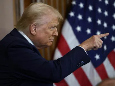 U.S. President Donald Trump points as he attends the annual Friends of Ireland luncheon hosted by U.S. House of Representatives Speaker Mike Johnson (R-LA) at the U.S. Capitol in Washington, D.C., U.S., March 12, 2025. REUTERS/Evelyn Hockstein