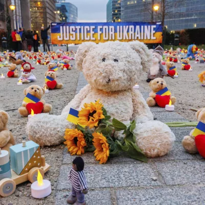 IMAGE DISTRIBUTED FOR AVAAZ.ORG - Avaaz members and Ukrainian refugees install thousands of kids' teddy bears and toys at Schuman Roundabout in front of the European Commission to highlight the reported abduction of thousands of Ukrainian children by Russia on Thursday Feb,23, 2022 in Brussels. Attendants call on EU, US, UK and Canadian leaders to sanction 14 Russian officials who are among those allegedly responsible for the abductions. (Olivier Matthys/AP Images for Avaaz.org)