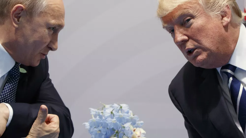 FILE &ndash; U.S. President Donald Trump, right, meets with Russian President Vladimir Putin at the G20 Summit in Hamburg, Germany, July 7, 2017. (AP Photo/Evan Vucci, File)