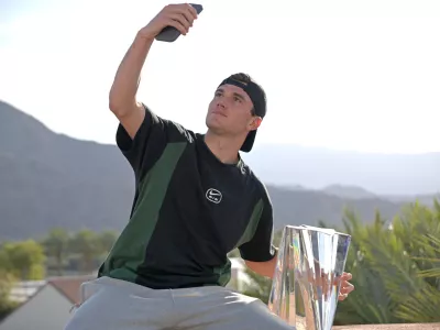 Mar 16, 2025; Indian Wells, CA, USA; Jack Draper (GBR) takes a selfie with the championship trophy after defeating Holger Rune (not pictured) in the final of the BNP Paribas Open at the Indian Well Tennis Garden. Mandatory Credit: Jayne Kamin-Oncea-Imagn Images