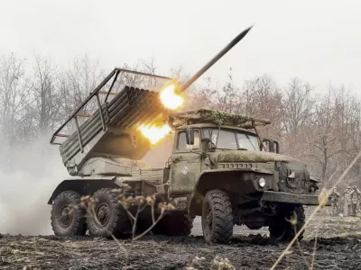 In this photo distributed by Russian Defense Ministry Press Service on Thursday, March 20, 2025, a Russian "Grad" self-propelled multiple rocket launcher fires towards Ukrainian positions in Ukraine. (Russian Defense Ministry Press Service via AP)
